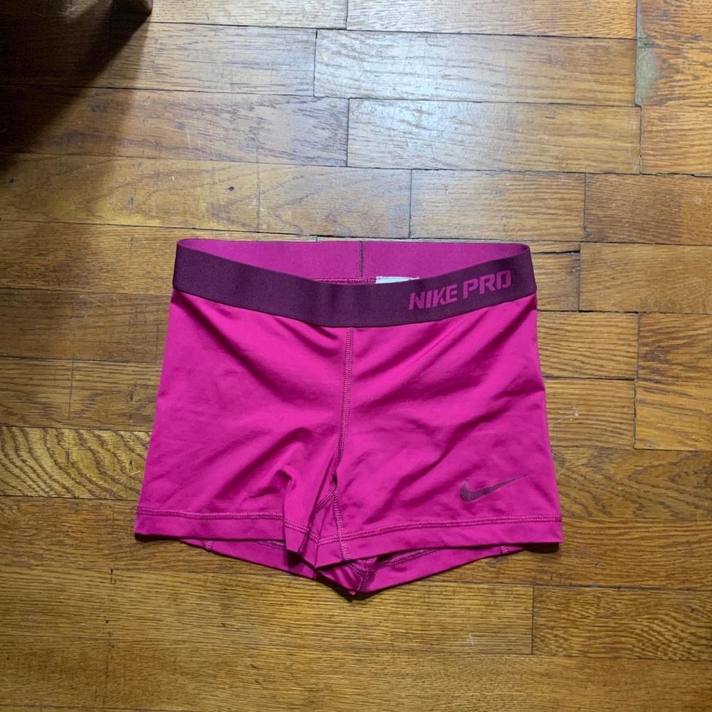 Hot pink nike pros